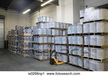 Stack of pallets in a warehouse View Large Photo Image Stock Image - Stack of pallets in a warehouse. Fotosearch