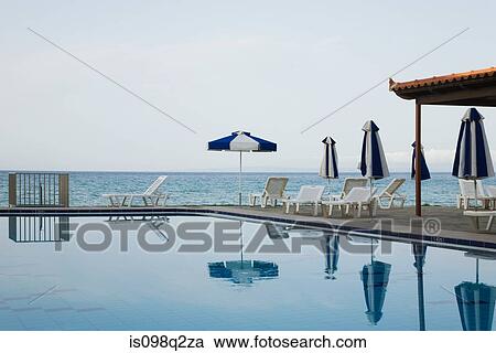 Swimming pool near the sea View Large Photo Image Stock Image - Swimming pool near the sea. Fotosearch