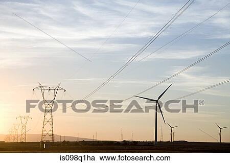 Wind turbines and pylons View Large Photo Image Stock Image - Wind turbines and pylons. Fotosearch
