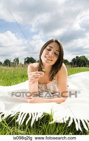 Stock Image - Woman in a field. Fotosearch
