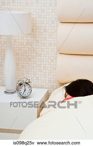 Woman in bed View Large Photo Image Stock Photo - Woman in bed. Fotosearch