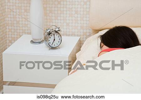 Woman in bed View Large Photo Image Stock Photograph - Woman in bed. Fotosearch