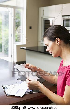 Woman reading letter View Large Photo Image Stock Photo - Woman reading letter. Fotosearch