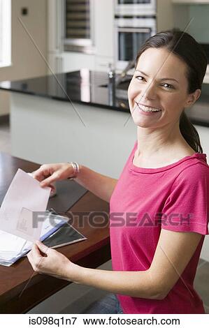 Woman with mail View Large Photo Image Stock Photo - Woman with mail. Fotosearch