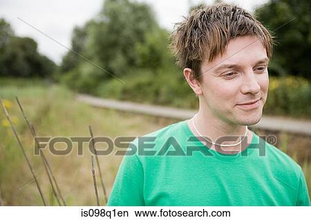 Picture - Young man thinking. Fotosearch