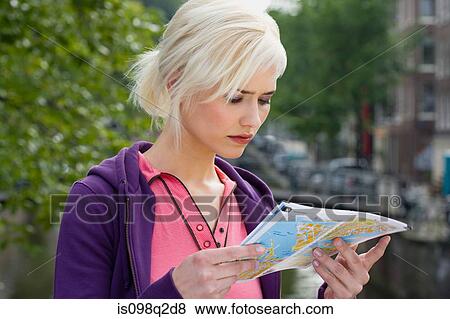 Stock Photo - Young woman map. Fotosearch