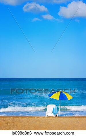 Beach umbrella on a deserted beach View Large Photo Image Stock Image - Beach umbrella on a deserted beach. Fotosearch