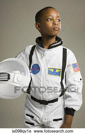 Stock Image - Boy in astronaut costume. Fotosearch