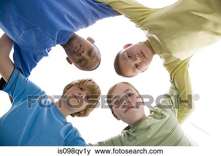 Children in huddle View Large Photo Image Stock Photo - Children in huddle. Fotosearch