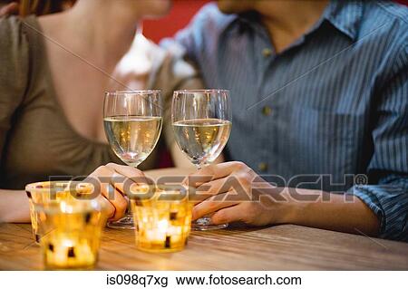 Couple drinking white wine View Large Photo Image Stock Image - Couple drinking white wine. Fotosearch