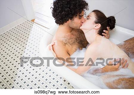 Couple kissing in the bath View Large Photo Image Stock Image - Couple kissing in the bath. Fotosearch