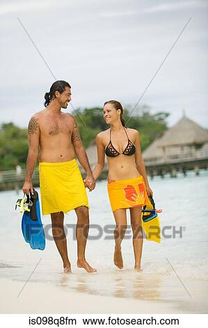 Couple on vacation in bora bora View Large Photo Image Picture - Couple on vacation in bora bora. Fotosearch