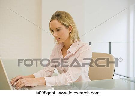 Female office worker View Large Photo Image Stock Photograph - Female office worker. Fotosearch