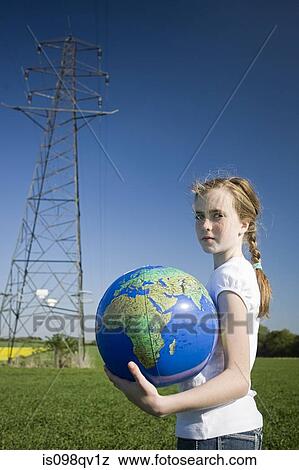 Girl by pylon with globe View Large Photo Image Stock Photo - Girl by pylon with globe. Fotosearch