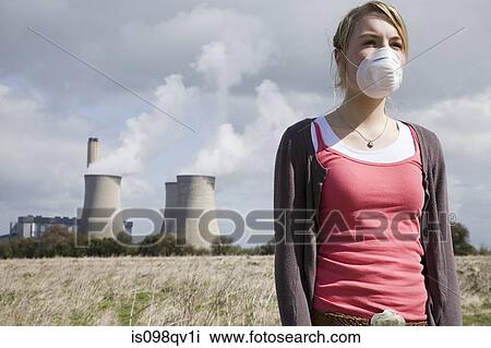 Girl in mask by power station View Large Photo Image Stock Image - Girl in mask by power station. Fotosearch