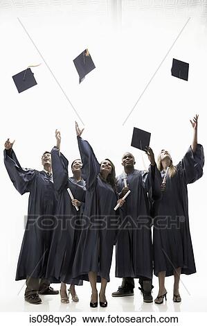 Graduates throwing mortarboards View Large Photo Image Stock Photography - Graduates throwing mortarboards. Fotosearch