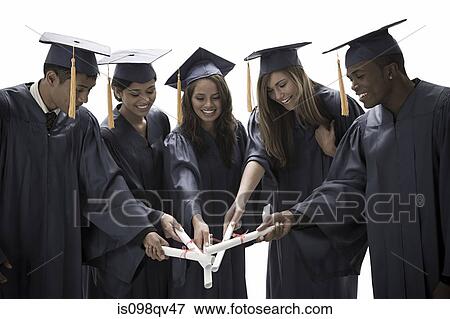 Graduates with scrolls View Large Photo Image Stock Photo - Graduates with scrolls. Fotosearch