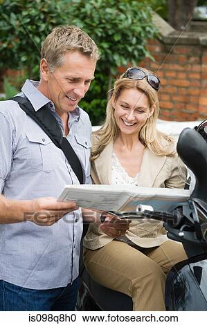 Mature couple looking at a map View Large Photo Image Stock Image - Mature couple looking at a map. Fotosearch