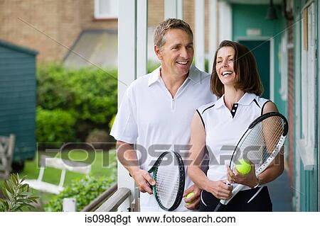 Mature tennis playing couple View Large Photo Image Stock Photograph - Mature tennis playing couple. Fotosearch