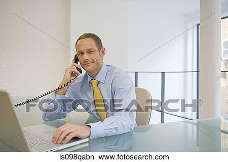 Office worker on telephone View Large Photo Image Picture - Office worker on telephone. Fotosearch