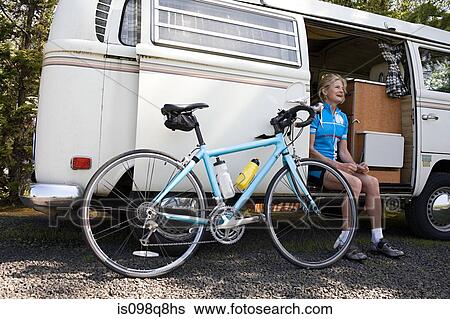 Stock Photograph - Senior female mountain cyclist. Fotosearch