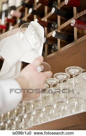 A man cleaning wine glasses View Large Photo Image Stock Image - A man cleaning wine glasses. Fotosearch