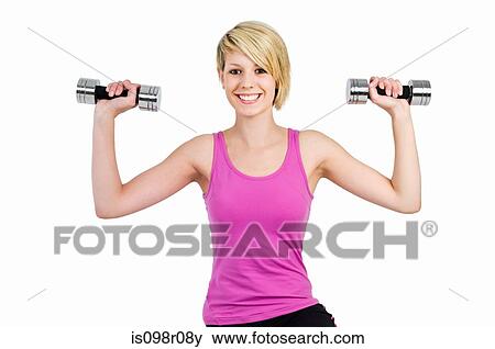 A teenage girl using dumbbells View Large Photo Image Stock Photo - A teenage girl using dumbbells. Fotosearch