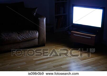 A tv on in a living room View Large Photo Image Stock Photo - A tv on in a living room. Fotosearch