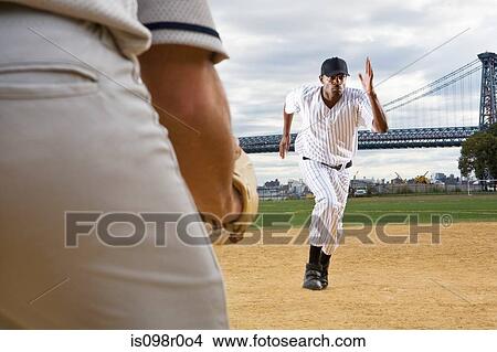 Baseball player running View Large Photo Image Picture - Baseball player running. Fotosearch