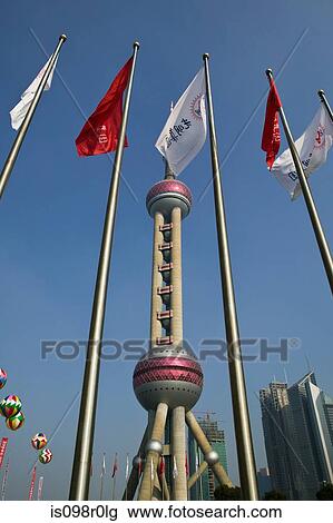 Flags and oriental pearl tower View Large Photo Image Stock Image - Flags and oriental pearl tower. Fotosearch