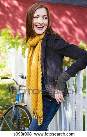 Stock Photo - Happy woman outdoors. Fotosearch