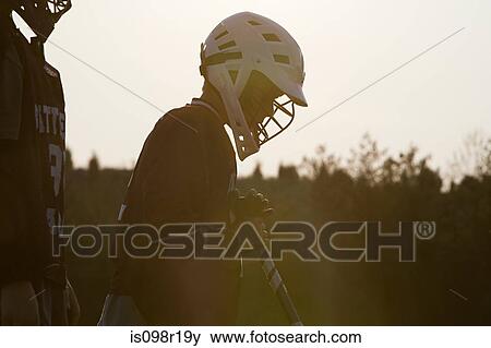 Stock Photo - Junior lacrosse player. Fotosearch