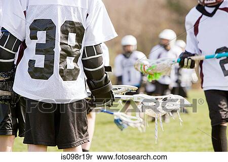 Lacrosse players View Large Photo Image Stock Photography - Lacrosse players. Fotosearch