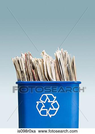 Newspapers in a recycling bin View Large Photo Image Stock Image - Newspapers in a recycling bin. Fotosearch