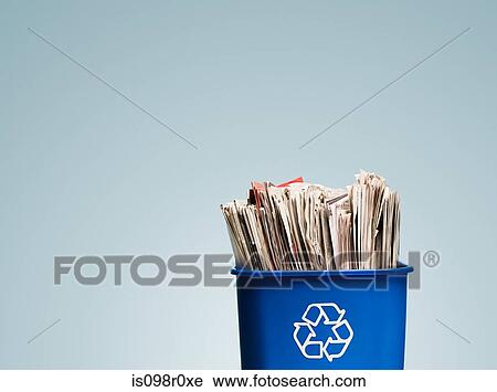 Newspapers in a recycling bin View Large Photo Image Stock Image - Newspapers in a recycling bin. Fotosearch