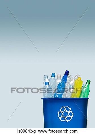 Plastic bottles in a recycling bin View Large Photo Image Stock Image - Plastic bottles in a recycling bin. Fotosearch