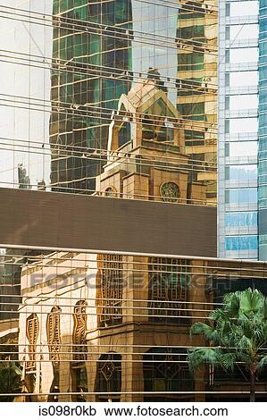 Reflection of hong kong city hall in building View Large Photo Image Stock Image - Reflection of hong kong city hall in building. Fotosearch