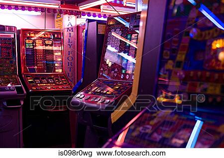 Slot machines in amusement arcade View Large Photo Image Stock Image - Slot machines in amusement arcade. Fotosearch