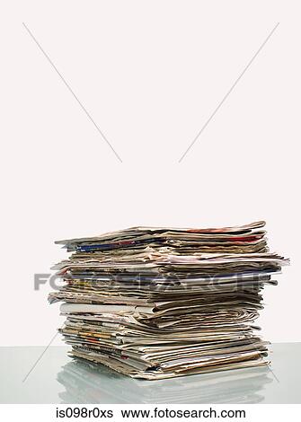 Stack of newspapers View Large Photo Image Stock Photograph - Stack of newspapers. Fotosearch