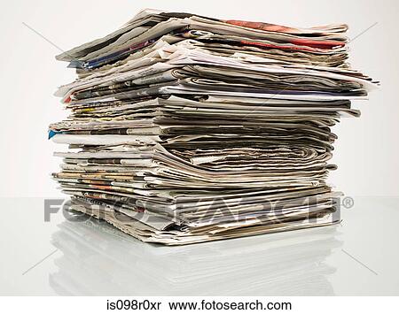 Stack of newspapers View Large Photo Image Stock Photography - Stack of newspapers. Fotosearch