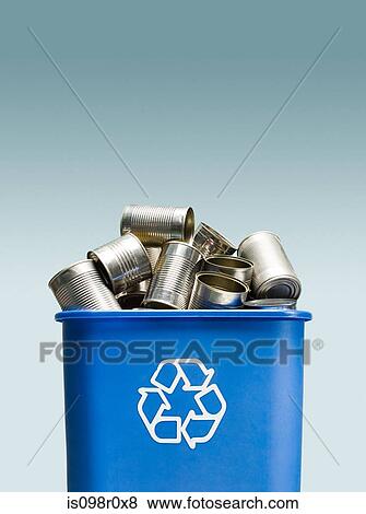 Tin cans in a recycling bin View Large Photo Image Stock Photo - Tin cans in a recycling bin. Fotosearch