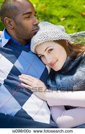 Young couple outdoors View Large Photo Image Picture - Young couple outdoors. Fotosearch