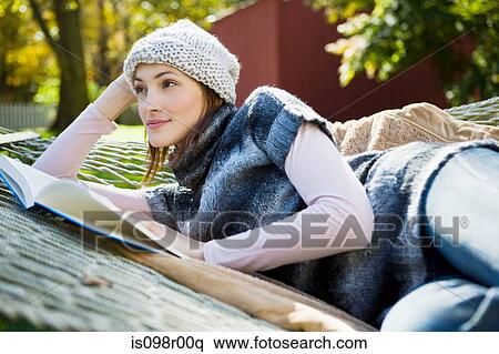 Young woman on hammock View Large Photo Image Stock Photography - Young woman on hammock. Fotosearch