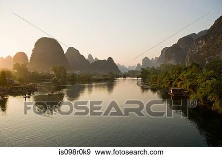 Yulong river and karst landscape View Large Photo Image Stock Photo - Yulong river and karst landscape. Fotosearch