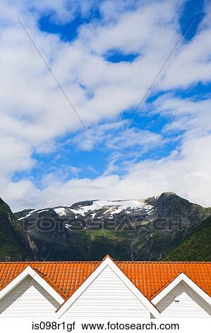 A roof top and mountains in norway View Large Photo Image Stock Image - A roof top and mountains in norway. Fotosearch