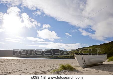 A rowboat on a beach on the isle of mull View Large Photo Image Stock Photo - A rowboat on a beach on the isle of mull. Fotosearch