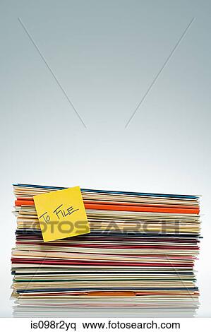 Adhesive note on files View Large Photo Image Stock Photography - Adhesive note on files. Fotosearch