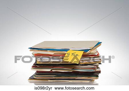 Adhesive note on files View Large Photo Image Stock Photography - Adhesive note on files. Fotosearch