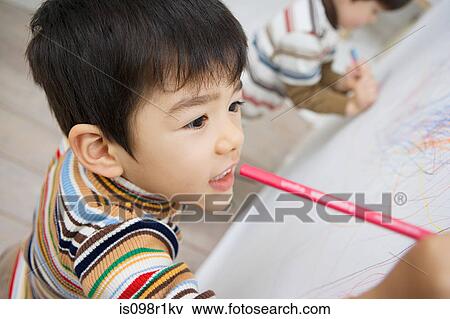 Boys drawing on a wall View Large Photo Image Stock Photo - Boys drawing on a wall. Fotosearch