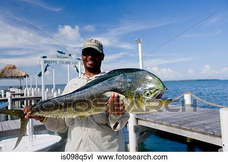 Fisherman with his catch. View Large Photo Image Stock Image - Fisherman with his catch.. Fotosearch